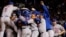 Los Mets celebran su victoria sobre los Cachorros de Chicago. Van a la Serie Mundial.