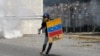 Un estudiante durante la manifestación del 14 de noviembre de 2019 contra el régimen de Nicolás Maduro. 