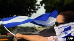 Manifestantes protestan contra Daniel Ortega en Nicaragua.