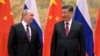 El presidente chino Xi Jinping (d) y el presidente ruso Vladimir Putin en Beijing, el 4 de febrero del 2022. (Alexei Druzhinin, Sputnik, Kremlin Pool Photo via AP, File)