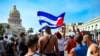 Protesta del 11 de julio frente al Capitolio, en La Habana. (YAMIL LAGE / AFP)