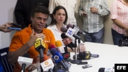 Leopoldo Lopez y María Corina Machado, dirigentes de la oposición venezonala